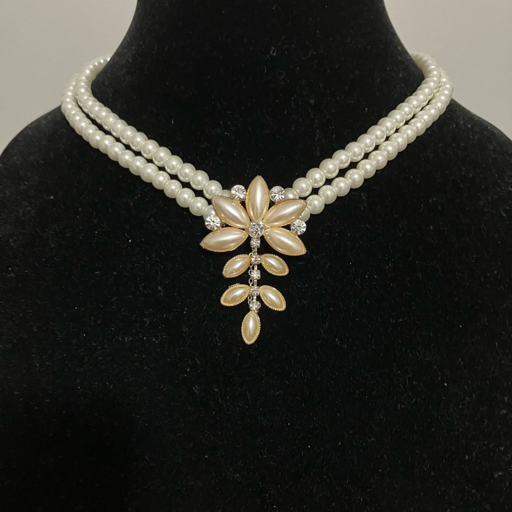 Pearl Triple-Strand Necklace with Gold Floral Pendant
